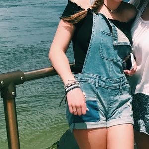 selling denim overalls from Hollister